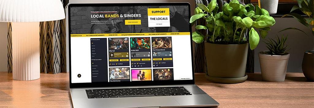 Laptop displaying an event and entertainment website homepage