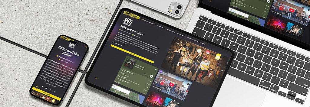 Angled view of a laptop displaying an event booking webpage